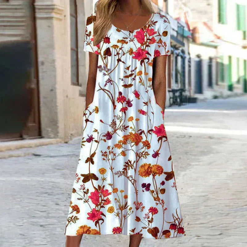 Effortless style women's floral midi dress, short sleeve design for casual elegant spring & summer fashion. Relaxed fit.