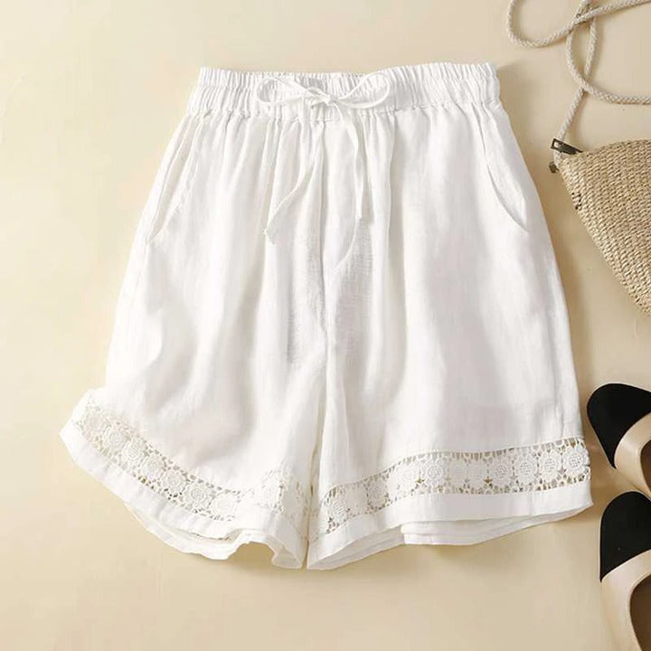 Women's floral shorts with a comfortable elastic waist, perfect for casual summer wear and relaxed fit.