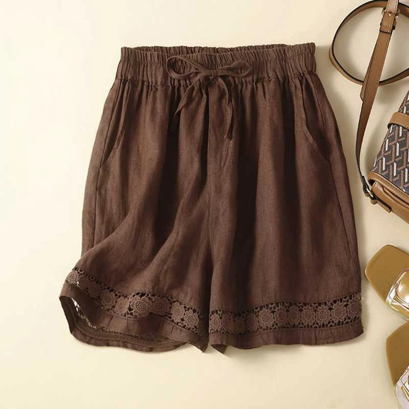 Vibrant floral print women's shorts with an elastic waist, offering ultimate comfort for summer activities.