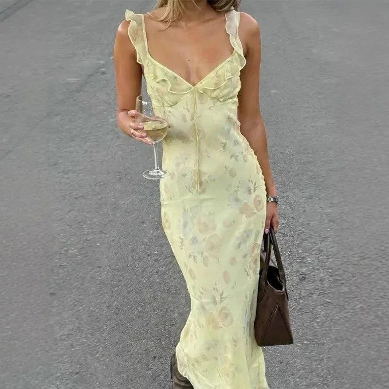 Flowy women's floral sleeveless backless beach dress, ideal for summer outings, vacation, and casual style.