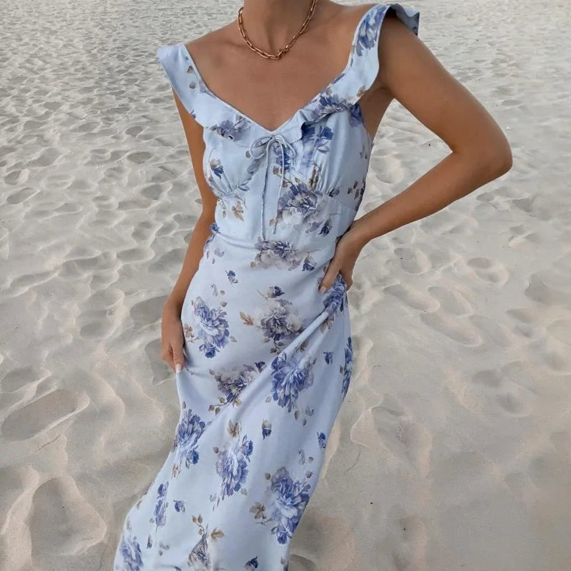 Chic women's floral sleeveless backless beach dress, a must-have sundress for summer vacations & resort wear.