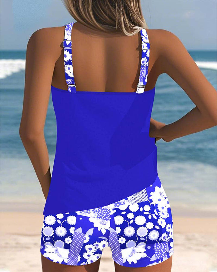 Two-piece women's floral tankini swimsuit set featuring a comfortable top and matching swim shorts for summer.