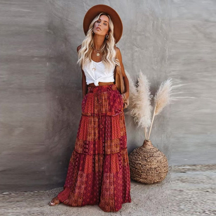 Bohemian women's high waist floral maxi skirt with tiered design, perfect for summer casual & vacation.