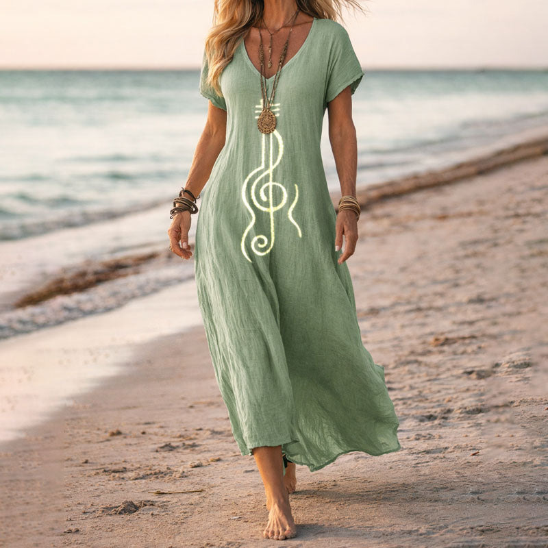 Vibrant floral bohemian maxi dress for women, featuring a flattering V-neck and flowy skirt.