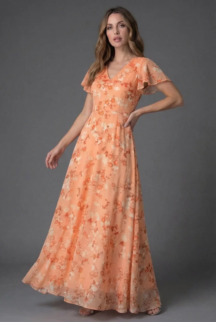 Flowing V-neck floral maxi dress for women, with chic flutter sleeves. A beautiful choice for evening or party wear.