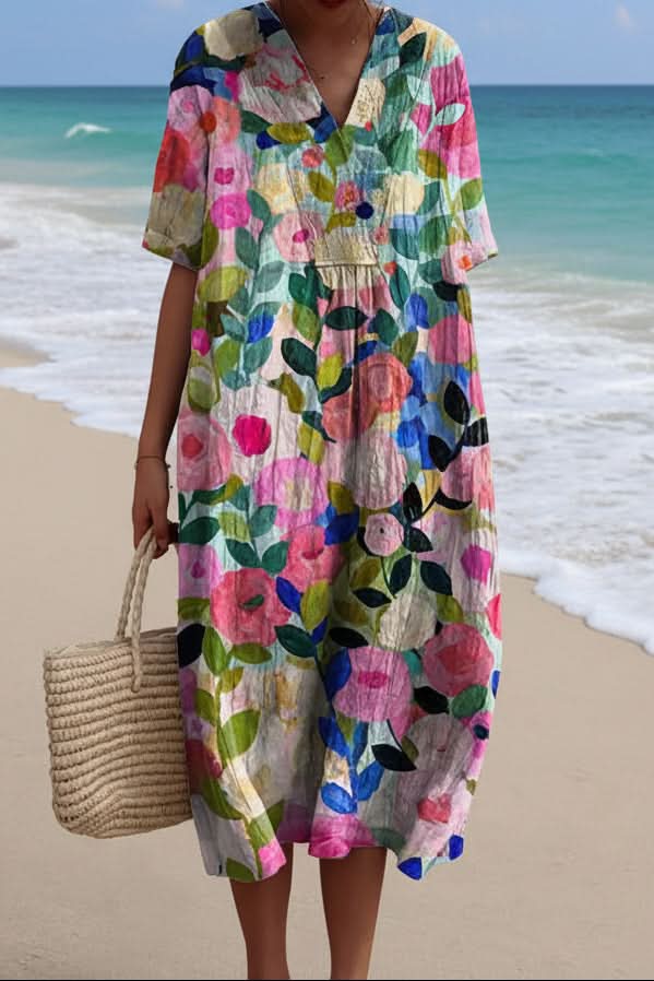 Women's floral V-neck midi dress for summer. Elegant A-line style, perfect casual day or vacation wear.