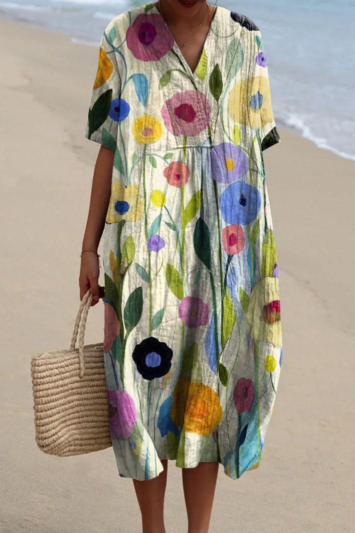 Chic floral V-neck midi dress, versatile for spring events, summer casual, or an elegant vacation outfit.