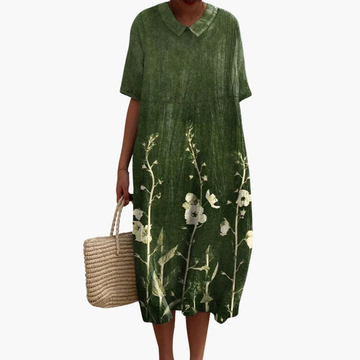 Stylish women's floral V-neck midi dress. Oversized, comfortable, ideal for everyday and vacation.