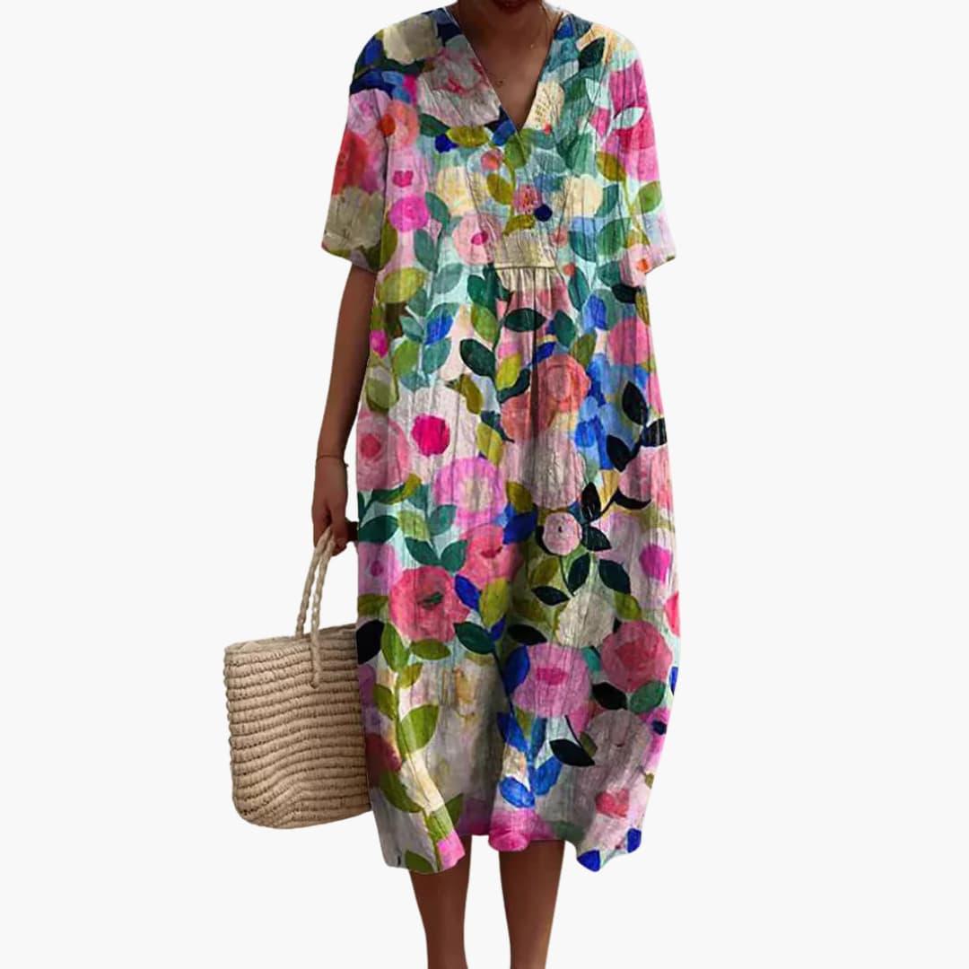 Casual summer floral print V-neck midi dress for women. Relaxed fit, short sleeve, comfortable everyday wear.