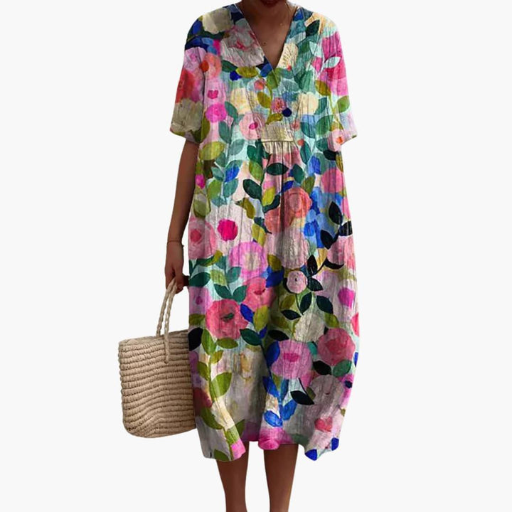 Casual summer floral print V-neck midi dress for women. Relaxed fit, short sleeve, comfortable everyday wear.
