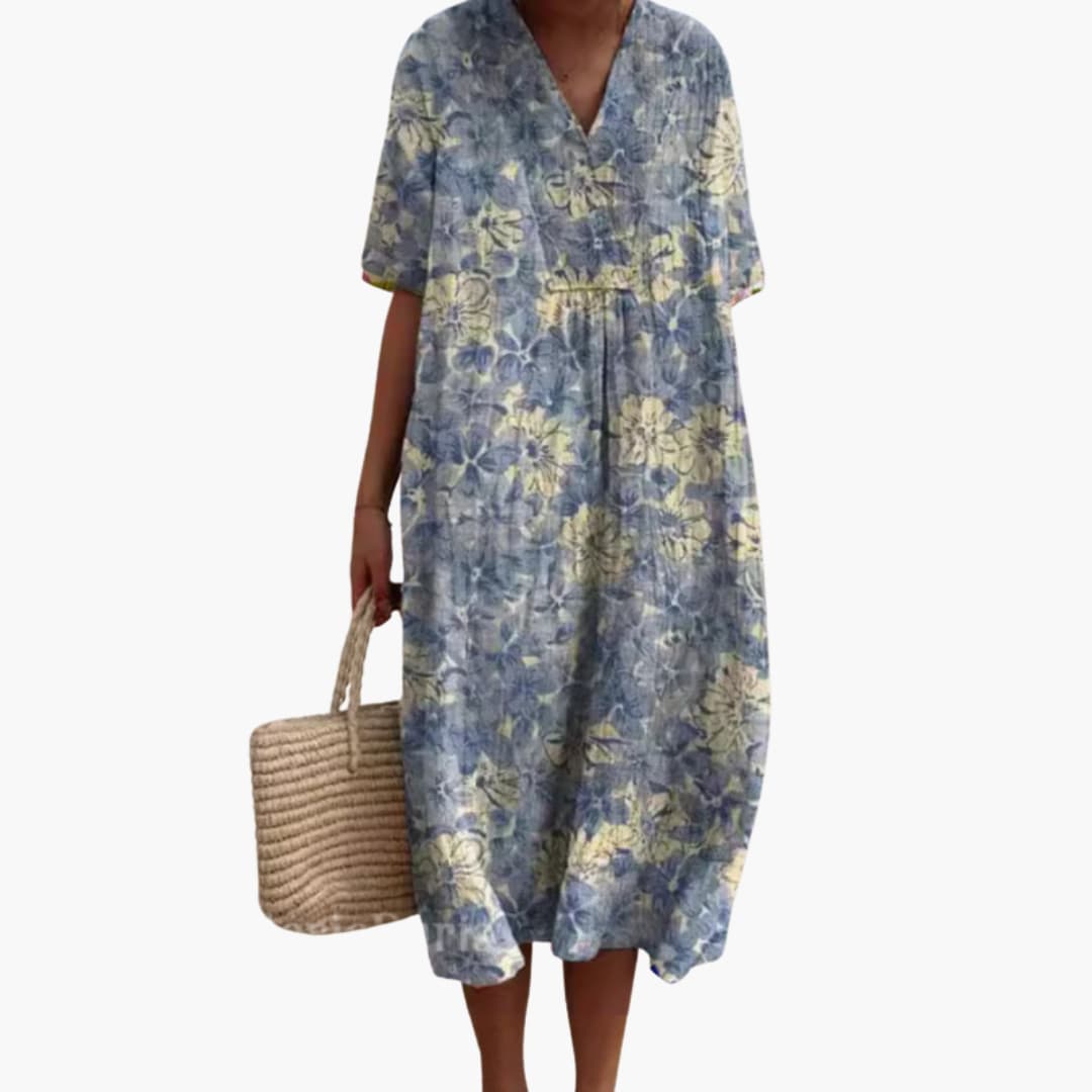 Relaxed fit floral V-neck midi dress for women. Oversized, comfortable, and stylish for summer days.