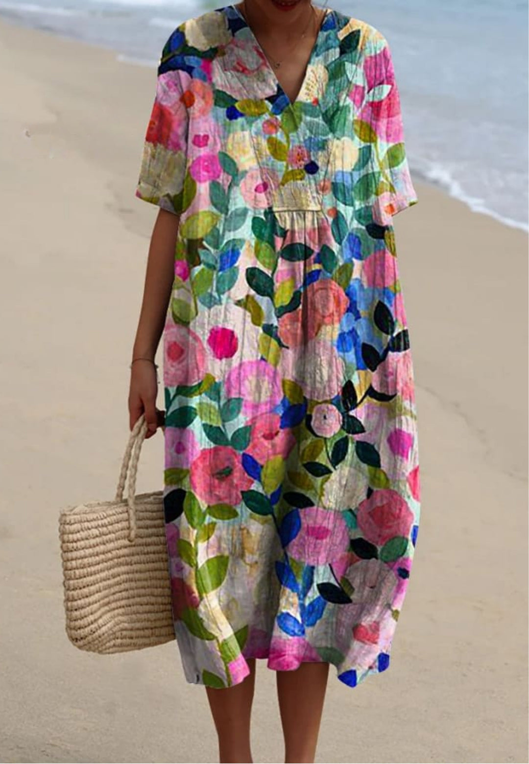 Women's floral V-neck short sleeve oversized midi dress, perfect for casual summer wear or vacation. Flowy, comfortable style.