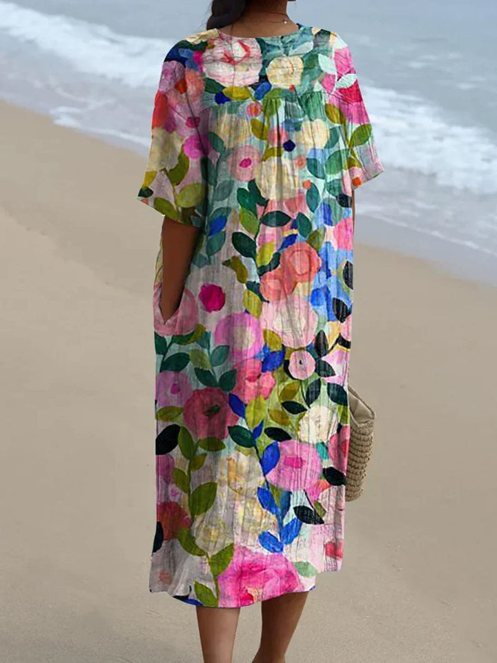 Versatile women's short sleeve floral midi dress with V-neck & oversized fit for comfortable, chic everyday or vacation fashion.