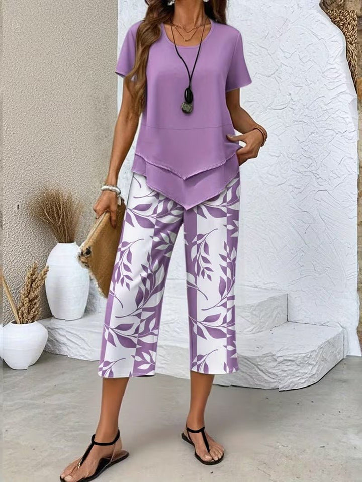 Stylish women's floral print V-neck top & flowy wide-leg pant casual set. Great for everyday or travel.