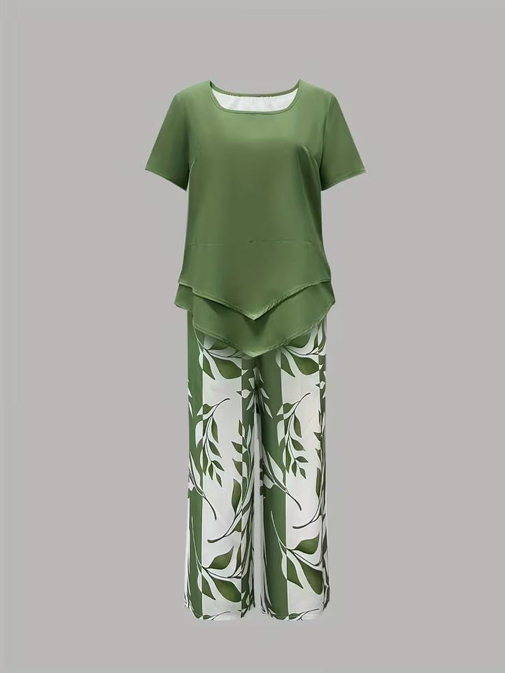 Close-up: women's short-sleeve floral print V-neck top from a comfy two-piece casual set with wide-leg pants.