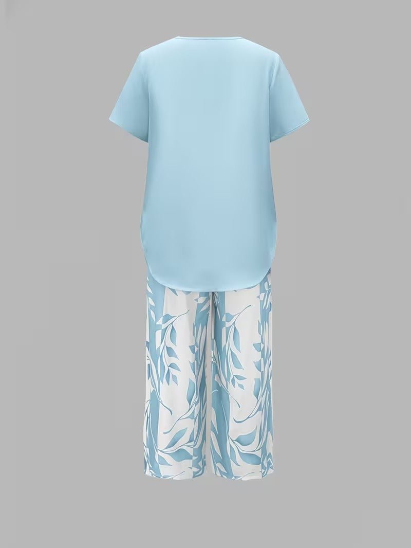 Soft, breathable fabric on women's floral V-neck top & wide-leg pant lounge wear set for ultimate comfort.