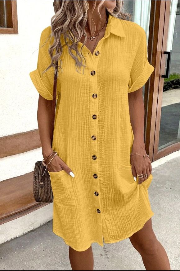 Model wearing a women's floral waist-defined midi dress, showcasing its flattering silhouette & flowy elegance.