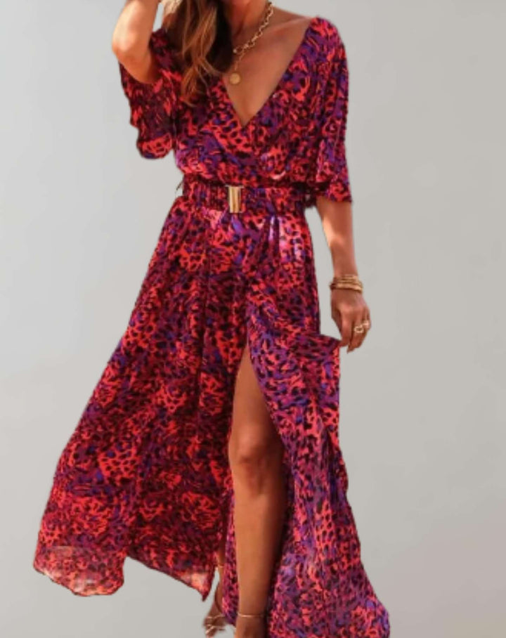 Flowy women's floral print maxi wrap dress with a stylish side slit and v-neck, ideal for summer.