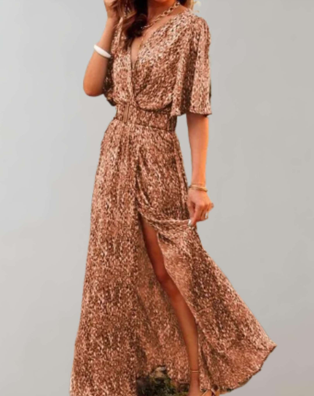 Vibrant floral pattern on a women's wrap maxi dress with a flattering v-neck and elegant side slit.