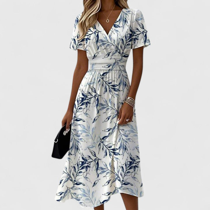 Flattering women's floral print V-neck wrap midi dress with comfortable flutter sleeves for stylish casual outings.