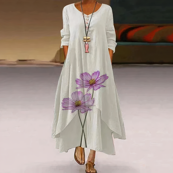 Stylish women's midi dress featuring vibrant asymmetric hem & comfortable long sleeves.