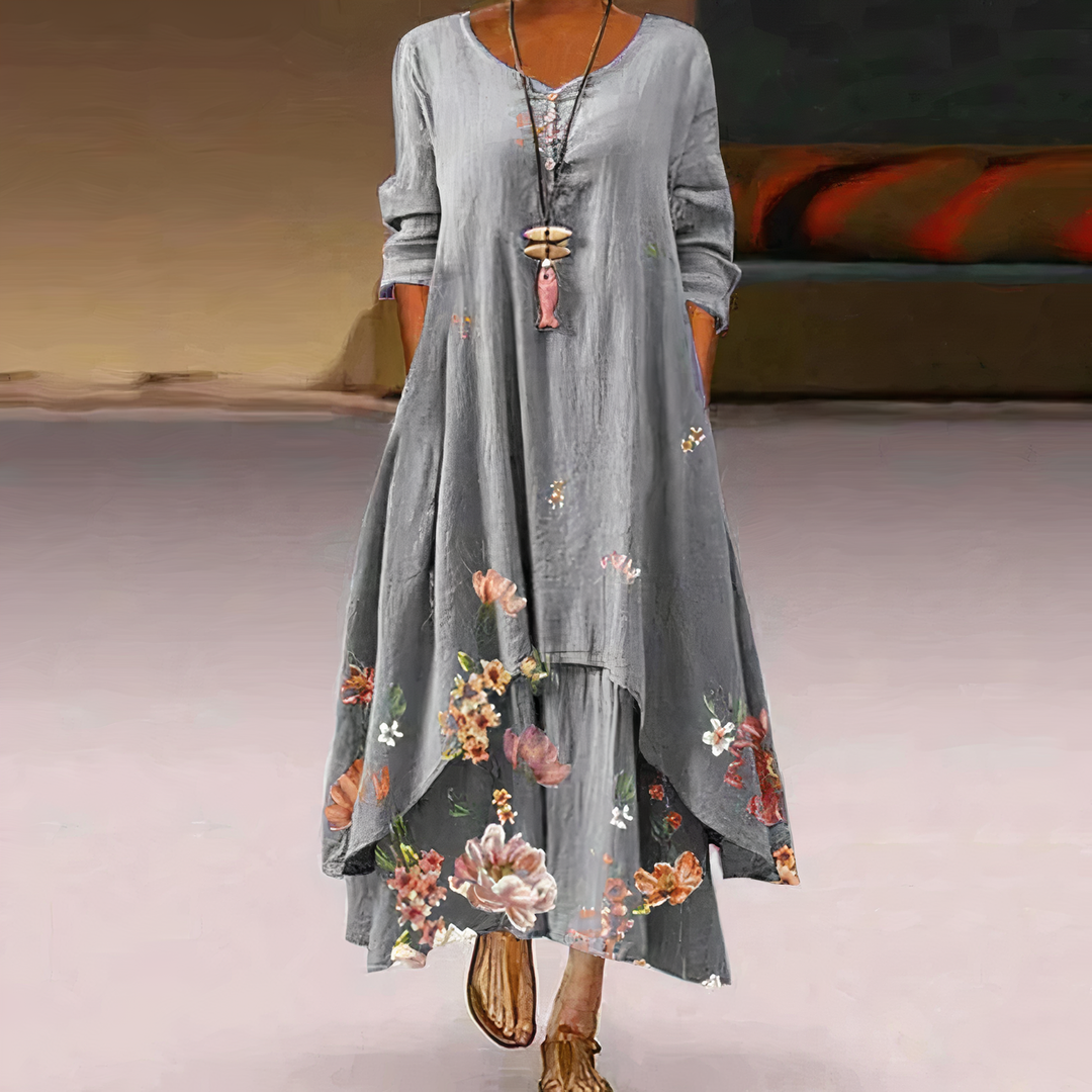 Summer/fall fashion: Women's flowy midi dress, long sleeves, vibrant colors, asymmetric hem.
