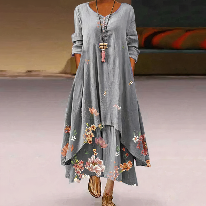 Summer/fall fashion: Women's flowy midi dress, long sleeves, vibrant colors, asymmetric hem.