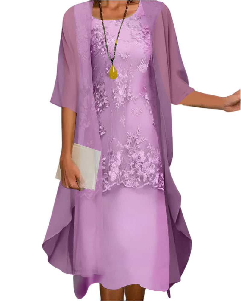 Stylish women's sheer sleeve midi dress, perfect as a wedding guest or elegant party dress. Flowing and formal.