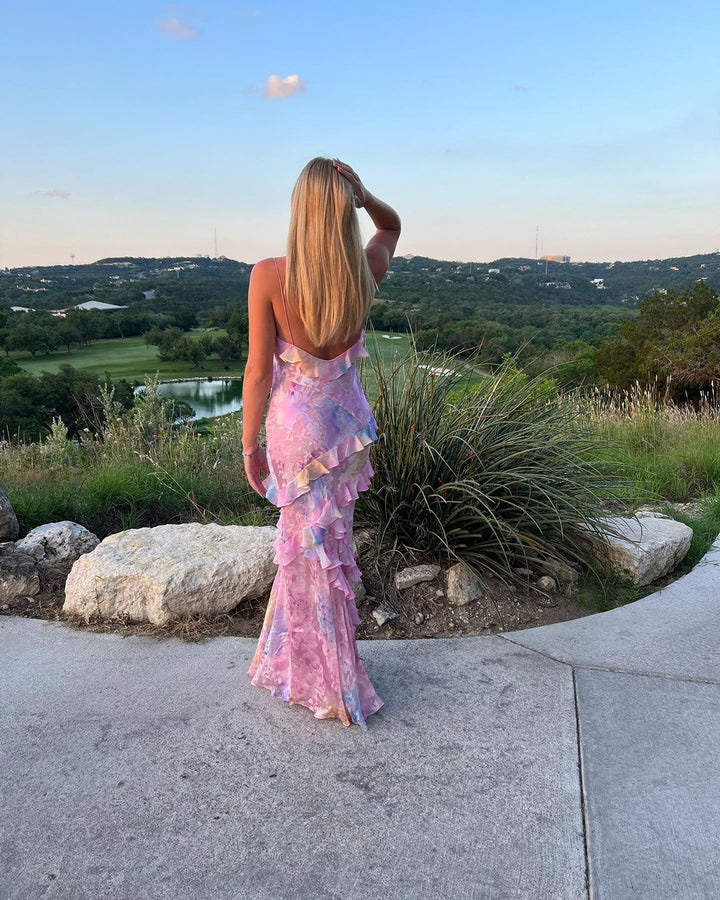 Flowy Women's Maxi Dress with cascading ruffles. Stylish open-back design for special occasions & summer parties.