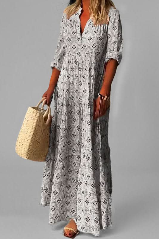 Effortless elegant women's maxi dress with flowing tiered skirt, great for any event.