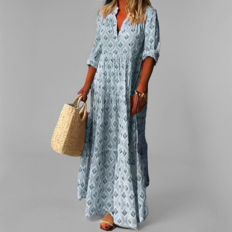 Comfortable women's flowing tiered V-neck maxi dress. Stylish long sleeve design for elegant casual fashion.