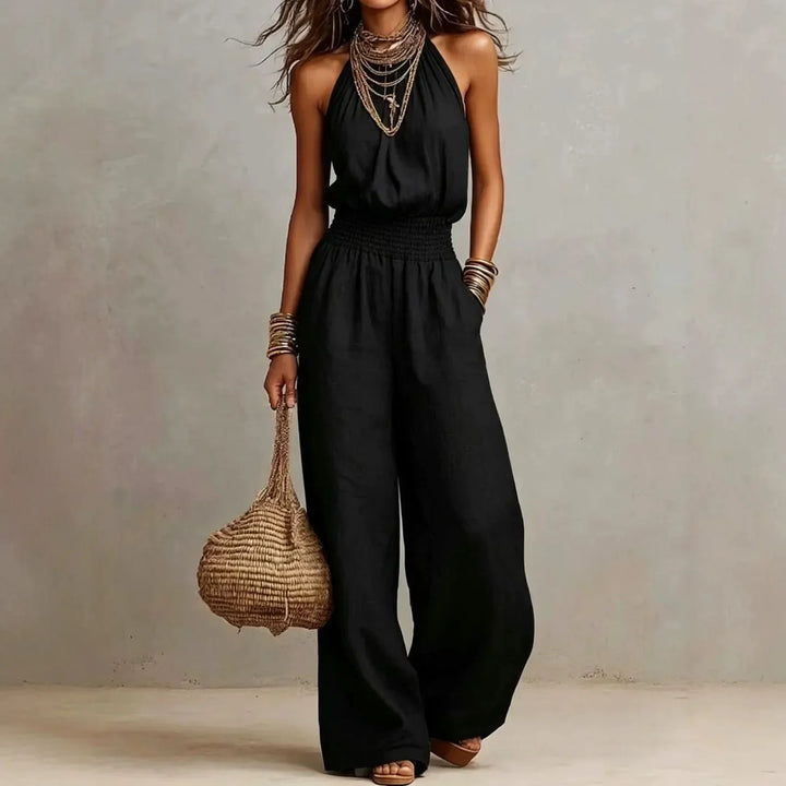 Elegant women's halter wide leg jumpsuit, ideal for warm weather vacations or comfortable casual summer style.