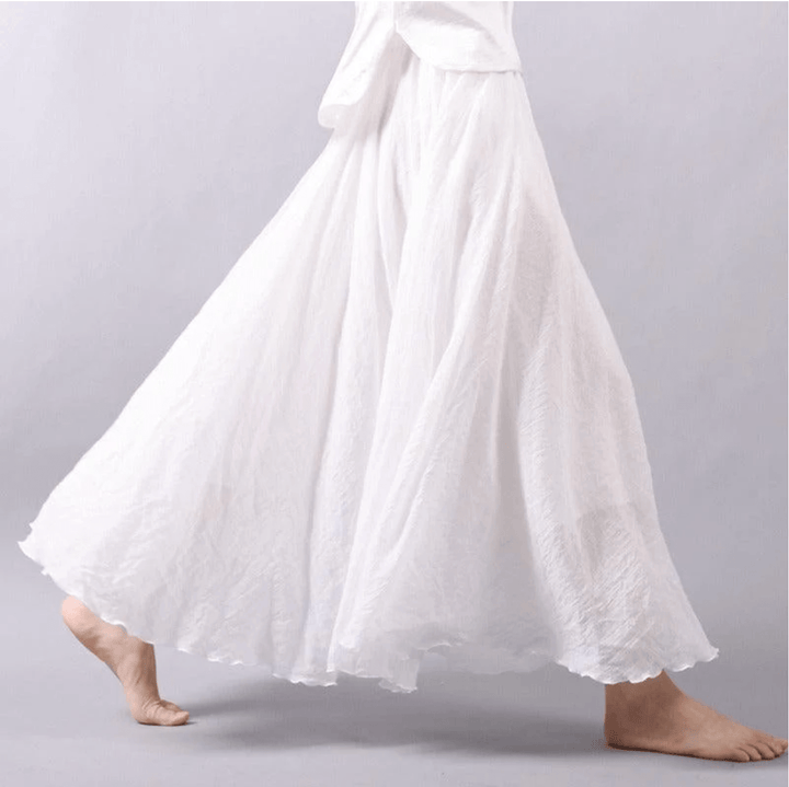 Women's flowy A-line maxi skirt, perfect for bohemian summer beachwear & casual elegance.