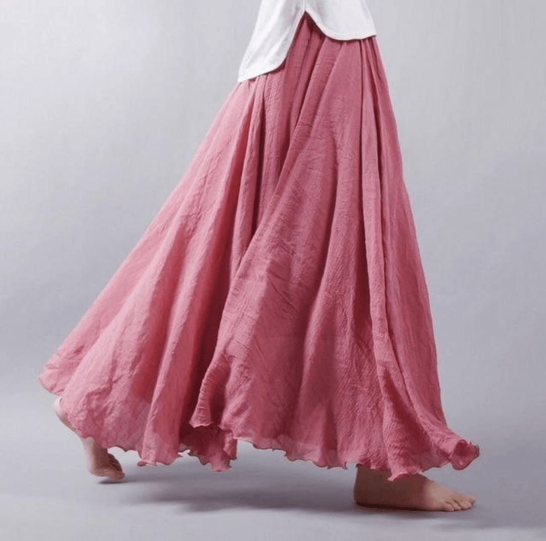 Versatile women's flowy maxi skirt for everyday summer style, comfortable for beach & casual wear.