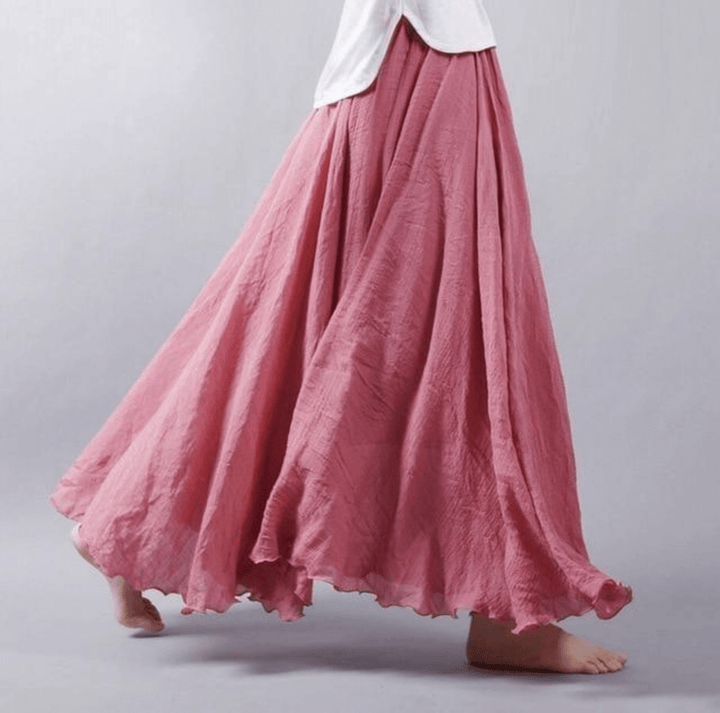 Versatile women's flowy maxi skirt for everyday summer style, comfortable for beach & casual wear.