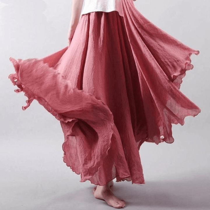 Lightweight flowy women's maxi skirt with A-line cut, excellent for bohemian summer beach & casual outfits.