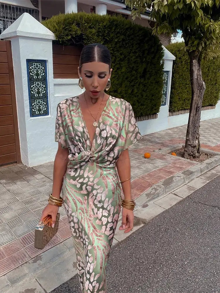Elegant women's abstract print flowy midi wrap dress, perfect for vacation, summer events & parties.
