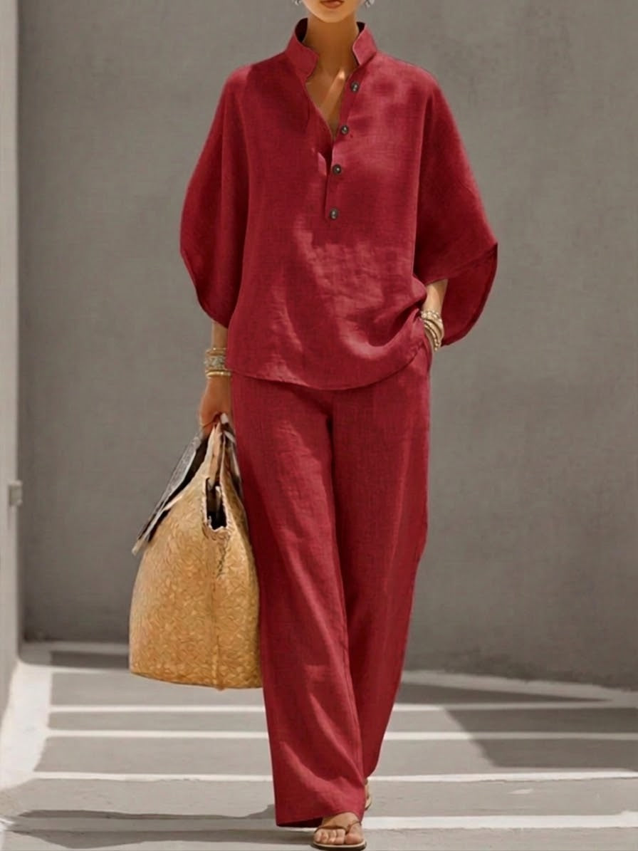 Women's fashion set: batwing blouse & wide trousers. A stylish two-piece for a comfortable look.