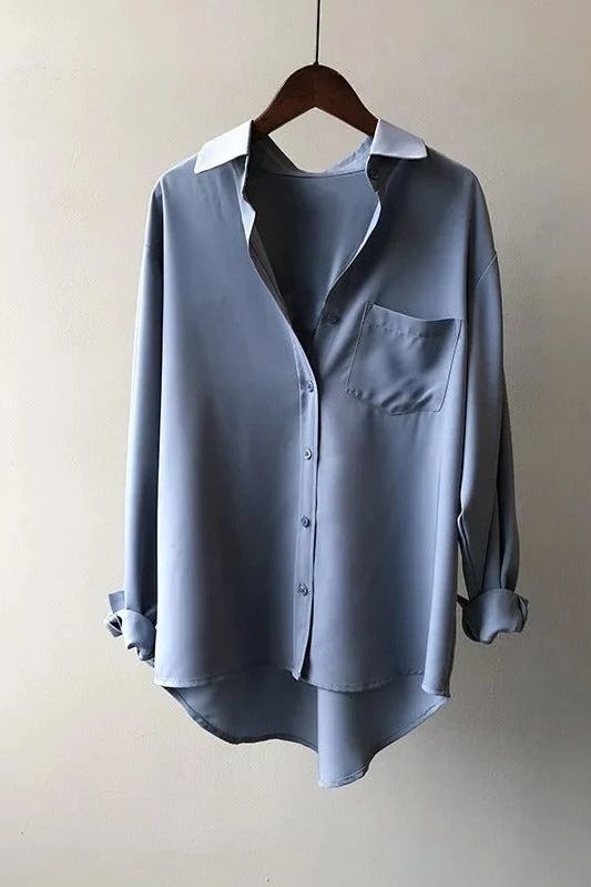Women's flowy blouse in a comfortable, elegant style, perfect for everyday wear or office attire.