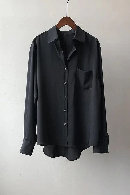 Comfortable flowy women's top, soft fabric, ideal for stylish casual wear or an elegant office outfit.
