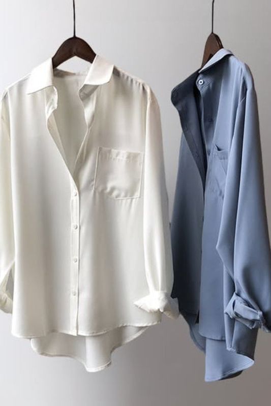 Elegant women's flowy printed shirt, versatile long sleeve top for comfortable casual wear or office fashion.