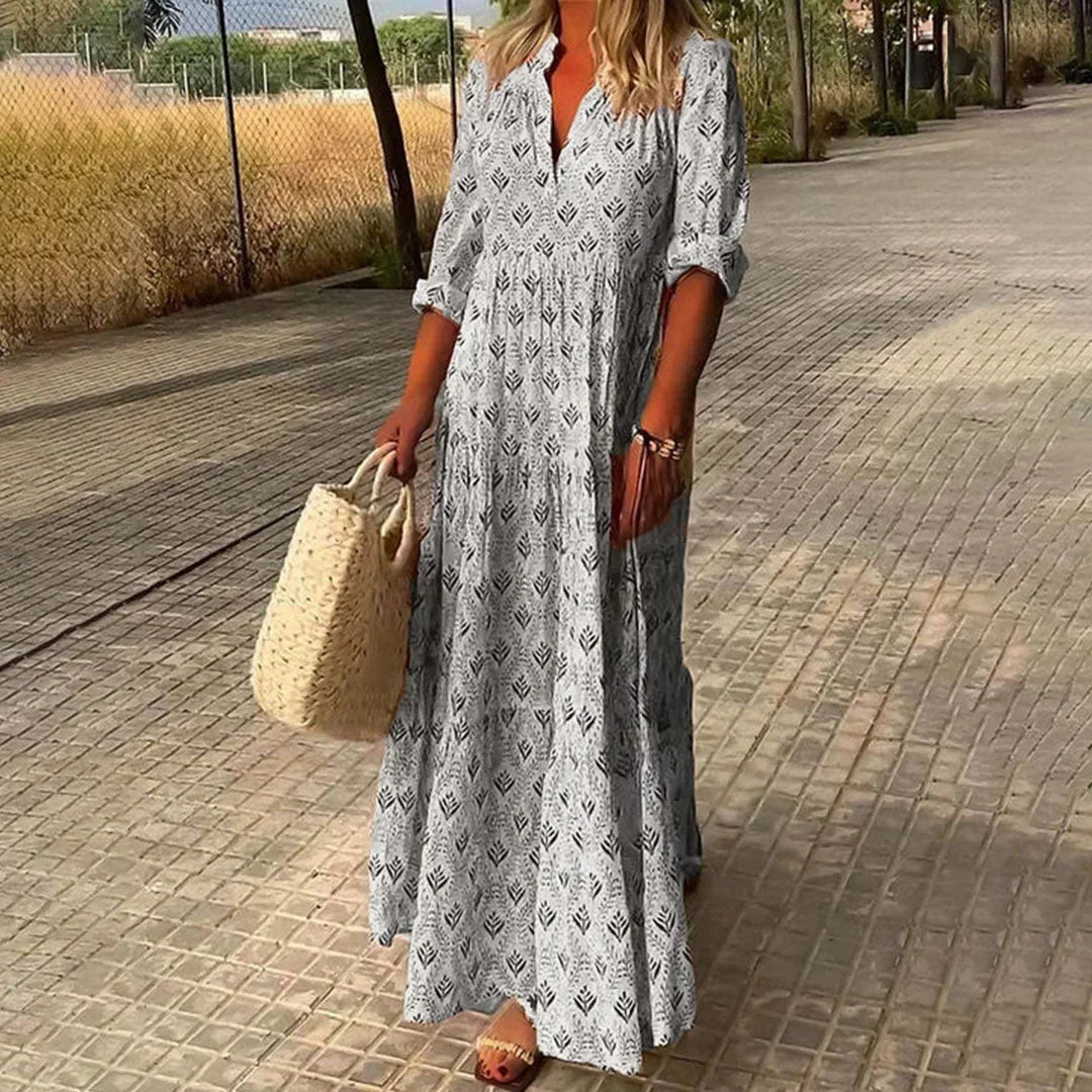 Relaxed fit women's long sleeve V-neck maxi dress. Bohemian style, perfect for flowy summer & casual beach outfits.
