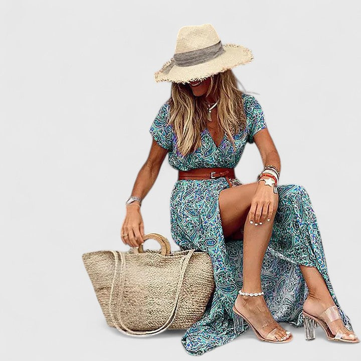 Elegant women's flowy boho maxi dress, styled for an evening. Versatile day-to-night summer fashion for any occasion.