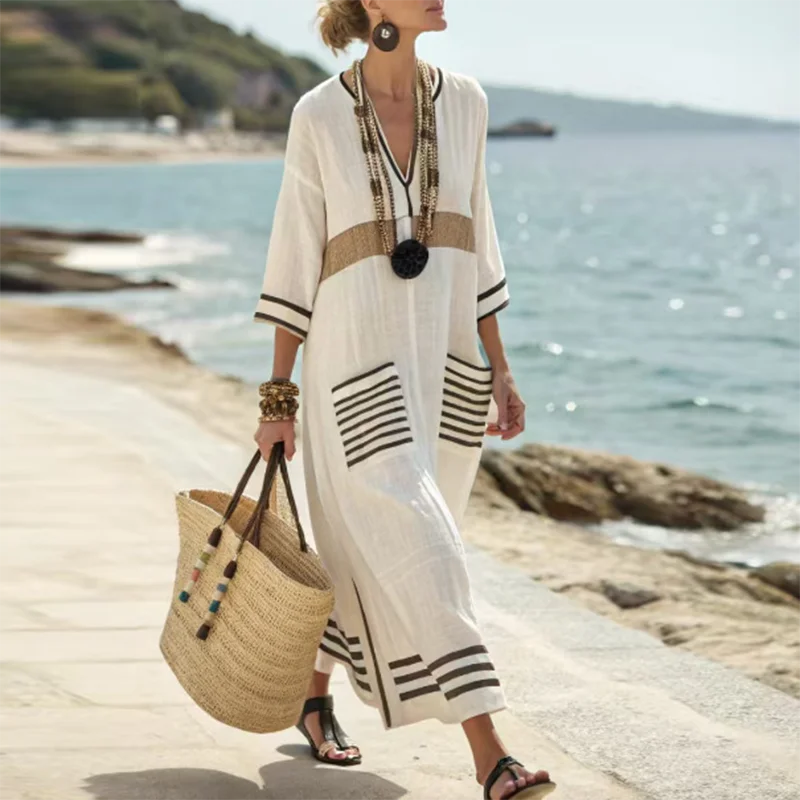 Stylish women's long V-neck striped boho maxi dress; versatile casual or resort wear for summer and vacation.