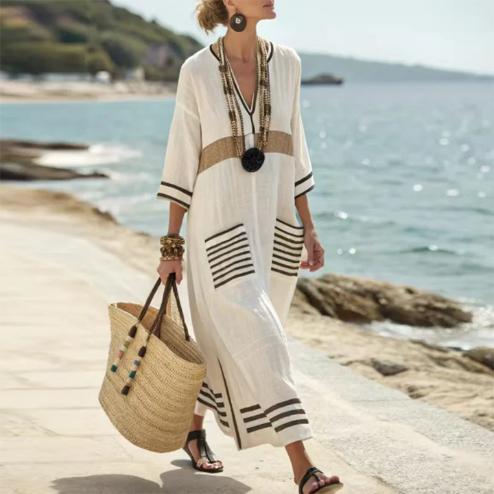 Stylish women's long V-neck striped boho maxi dress; versatile casual or resort wear for summer and vacation.