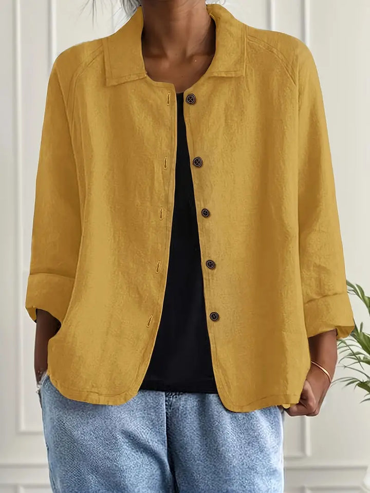 Breathable women's flowy cardigan, button-front shirt style, ideal for light summer fashion.