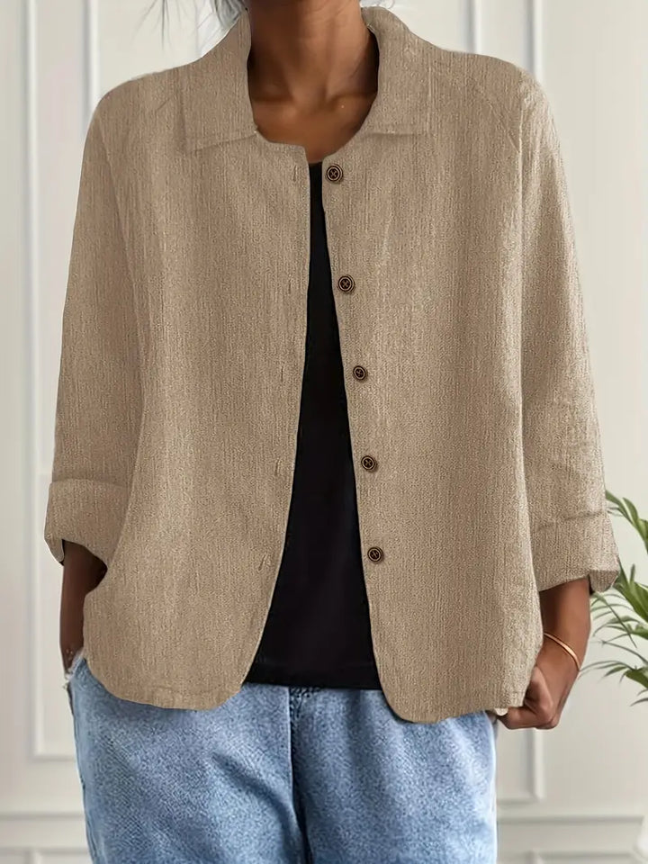 Elegant women's flowy top, a button-front shirt cardigan for a chic, versatile look.