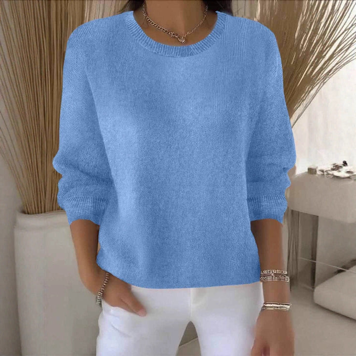 Comfortable women's sweater, relaxed flowy fit. Casual chic everyday wear for cold seasons.