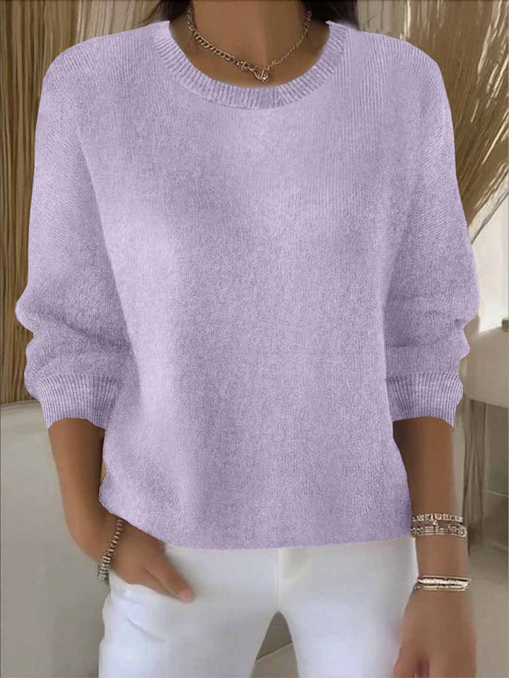 Stylish women's flowy sweater, perfect casual top for an effortless and cozy look.