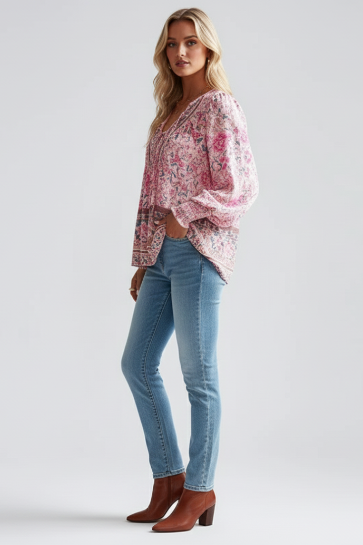 Stylish women's long sleeve floral blouse, V-neck, and relaxed fit. Versatile flowy top for spring outfits.